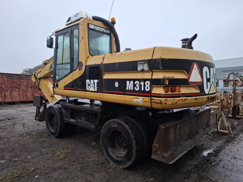 Caterpillar M318 - Ratastel ekskavaator: pilt 3 Caterpillar M318 - Ratastel ekskavaator: pilt 3