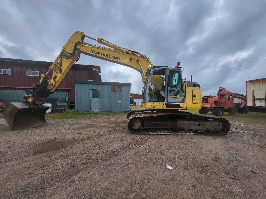 New Holland Kobelco E 235 B SR-2 - Lintekskavaator: pilt 2 New Holland Kobelco E 235 B SR-2 - Lintekskavaator: pilt 2