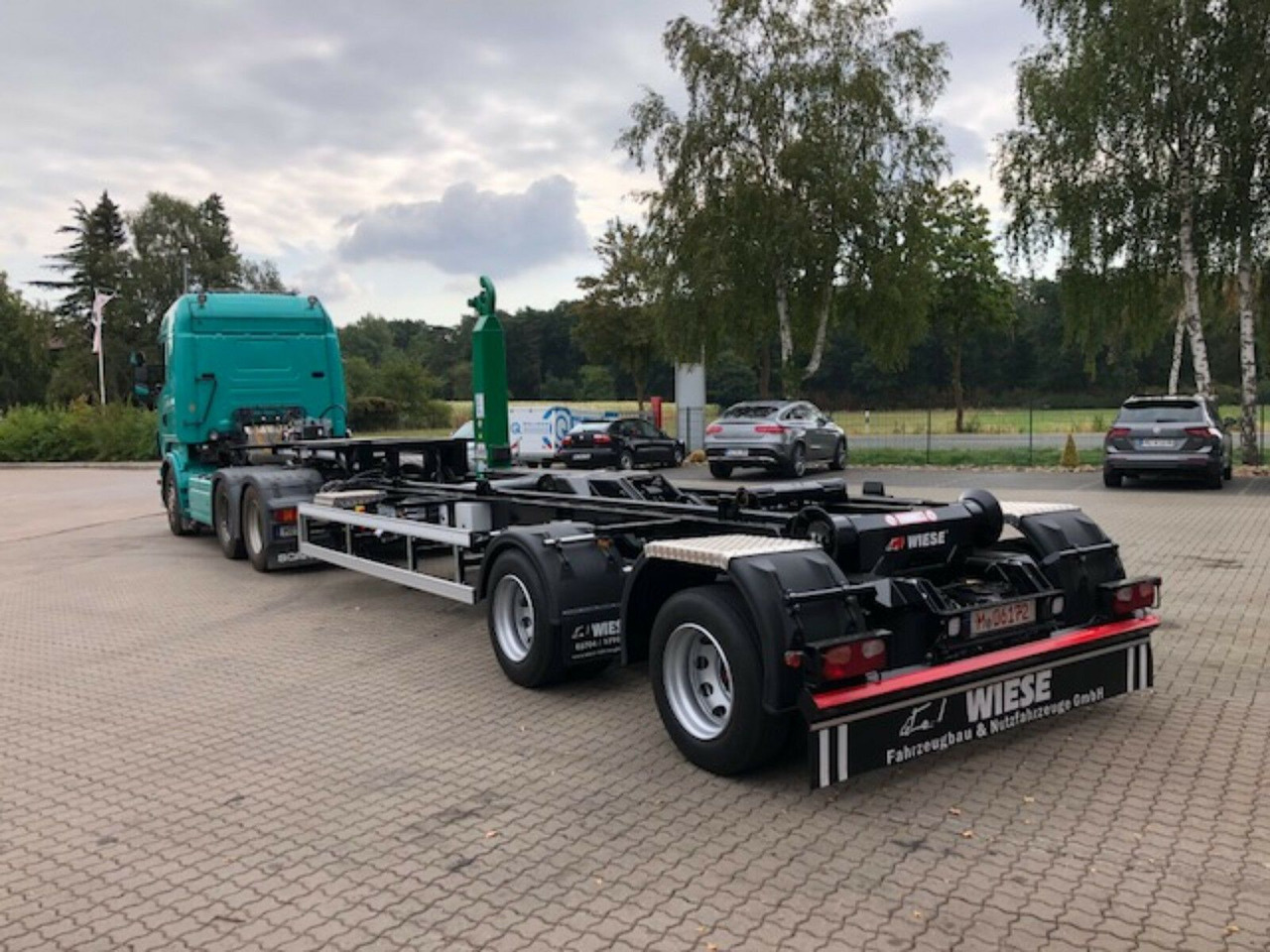 Auflieger Abrollkipper Hakenlift Hooklift - Konteinerveduk/ Tõstukiga poolhaagis: pilt 1 Auflieger Abrollkipper Hakenlift Hooklift - Konteinerveduk/ Tõstukiga poolhaagis: pilt 1