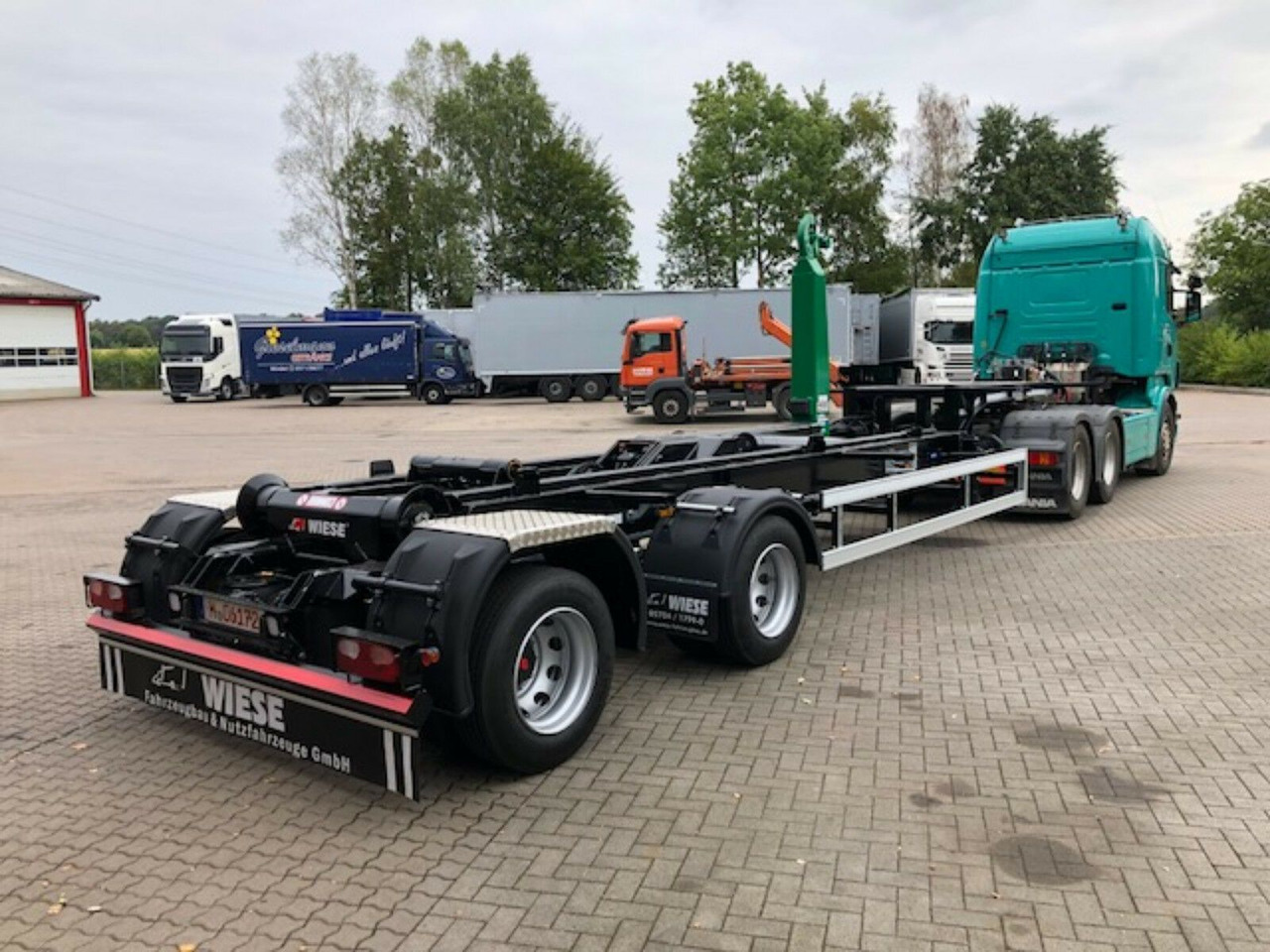 Auflieger Abrollkipper Hakenlift Hooklift - Konteinerveduk/ Tõstukiga poolhaagis: pilt 3 Auflieger Abrollkipper Hakenlift Hooklift - Konteinerveduk/ Tõstukiga poolhaagis: pilt 3