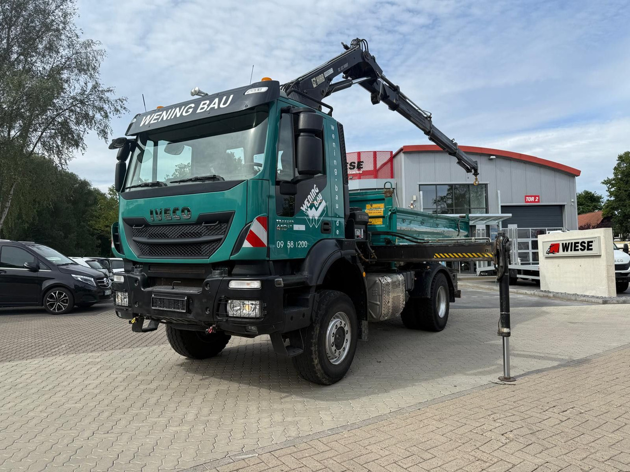 Iveco AD190 T/W Trakker 410 4x4 Allrad Kran KipperHIAB - Kallurauto, Kraanaga veoauto: pilt 1 Iveco AD190 T/W Trakker 410 4x4 Allrad Kran KipperHIAB - Kallurauto, Kraanaga veoauto: pilt 1