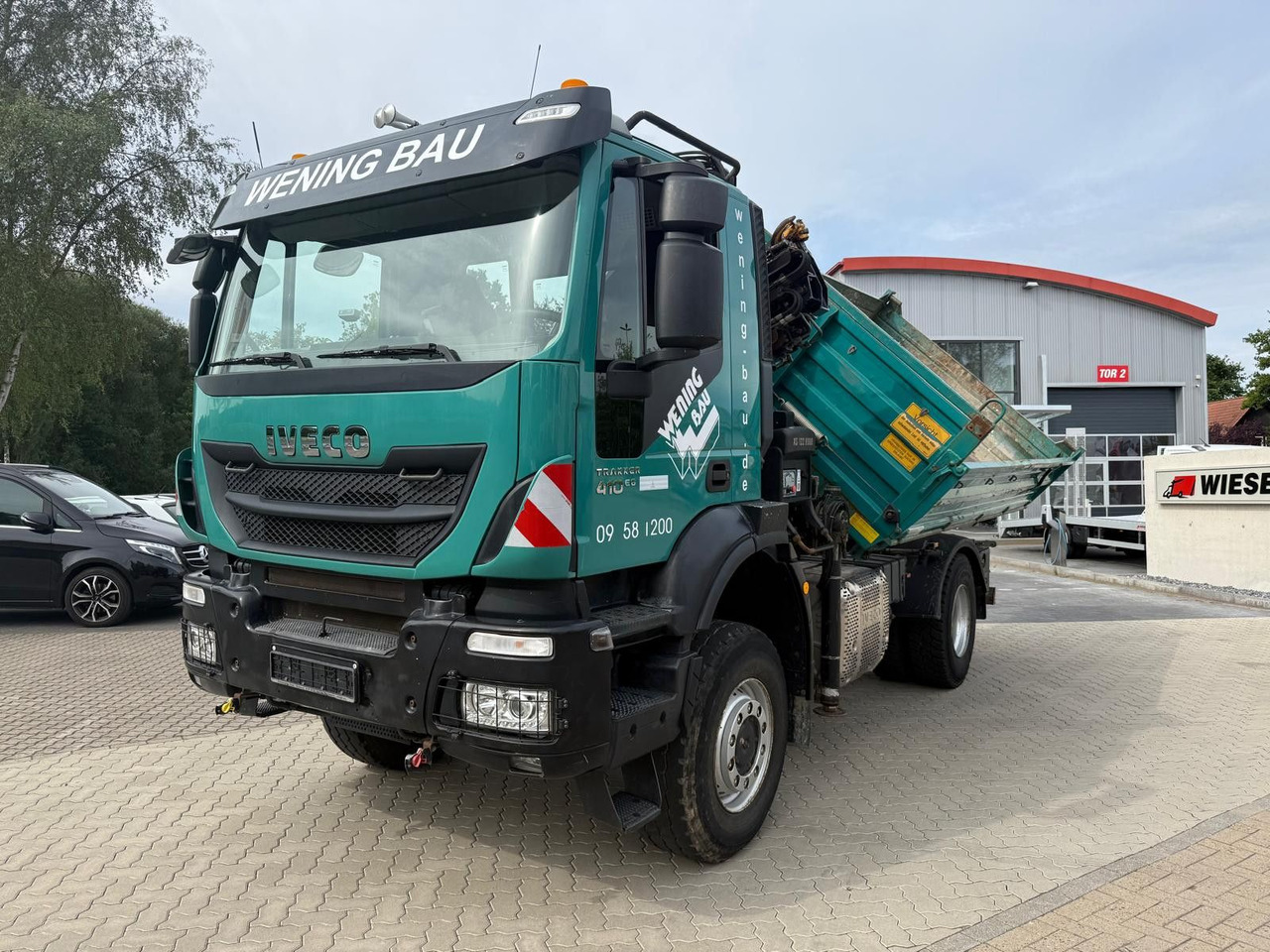 Iveco AD190 T/W Trakker 410 4x4 Allrad Kran KipperHIAB - Kallurauto, Kraanaga veoauto: pilt 1 Iveco AD190 T/W Trakker 410 4x4 Allrad Kran KipperHIAB - Kallurauto, Kraanaga veoauto: pilt 1