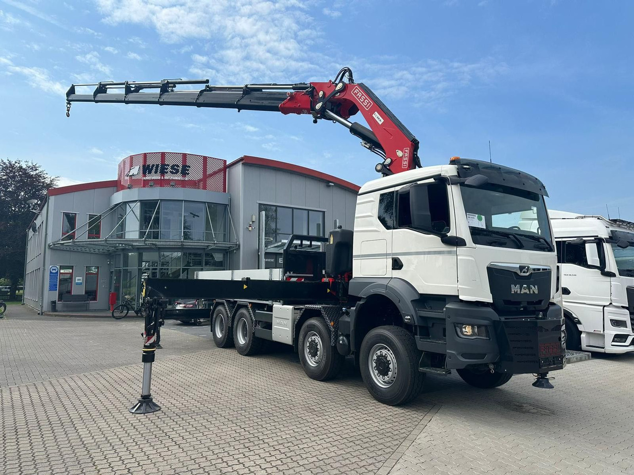 MAN TGS 41.520 8x8 mit Fassi Ladekran F710RA.2.26 - Kraanaga veoauto: pilt 1 MAN TGS 41.520 8x8 mit Fassi Ladekran F710RA.2.26 - Kraanaga veoauto: pilt 1