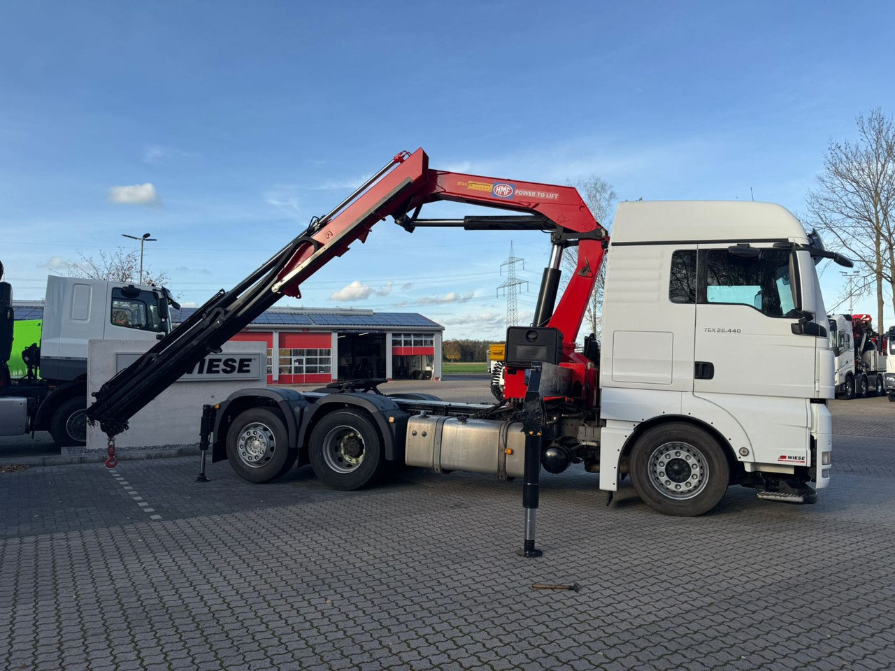 MAN TGX 26.440 6x2 mit HMF 3000-5 Kran Top Zustand - Kraanaga veoauto: pilt 1 MAN TGX 26.440 6x2 mit HMF 3000-5 Kran Top Zustand - Kraanaga veoauto: pilt 1