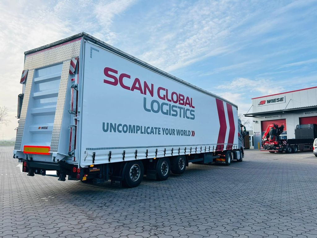 Mega Gabelstaplertransporter Ladebordwand9t Mega Gabelstaplertransporter Ladebordwand9t - Platvorm/ Madelpoolhaagis: pilt 2 Mega Gabelstaplertransporter Ladebordwand9t Mega Gabelstaplertransporter Ladebordwand9t - Platvorm/ Madelpoolhaagis: pilt 2