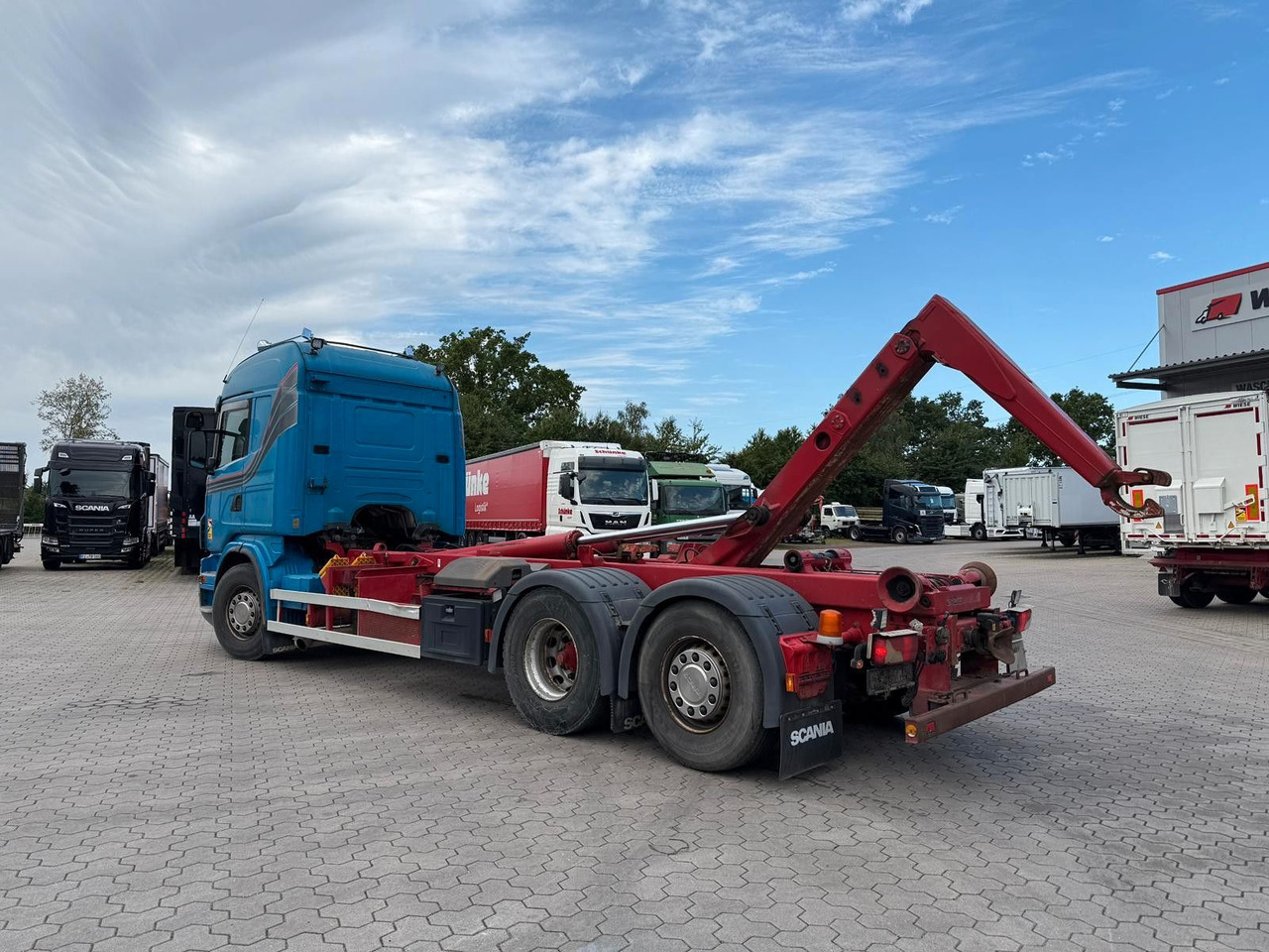 Scania G440 Abrollkipper/Hakenlift - Konkstõstukiga veoauto: pilt 1 Scania G440 Abrollkipper/Hakenlift - Konkstõstukiga veoauto: pilt 1