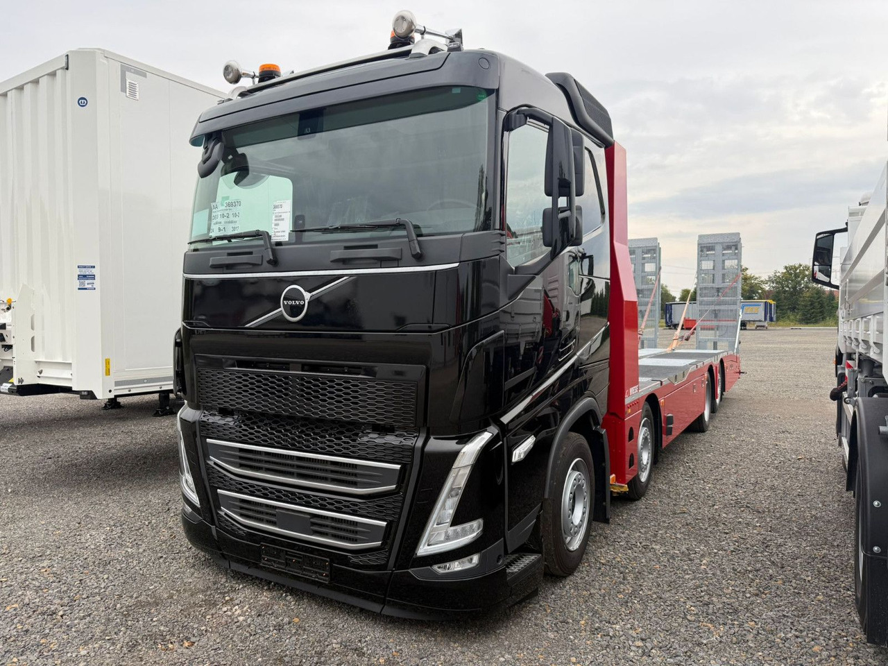 Volvo Arbeitsbühnen Baumaschinentransporter mit Rampen - Madelveok/ Platvormveok: pilt 2 Volvo Arbeitsbühnen Baumaschinentransporter mit Rampen - Madelveok/ Platvormveok: pilt 2
