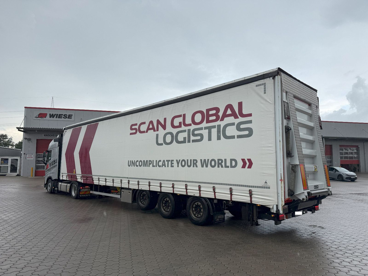 Wiese Mega Schiebeplane mit Dhollandia Rampe 9t - Madal platvormpoolhaagis: pilt 1 Wiese Mega Schiebeplane mit Dhollandia Rampe 9t - Madal platvormpoolhaagis: pilt 1