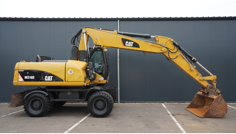 Caterpillar M318D 4X4 WHEELED EXCAVATOR - Ehitusmasinad: pilt 2 Caterpillar M318D 4X4 WHEELED EXCAVATOR - Ehitusmasinad: pilt 2