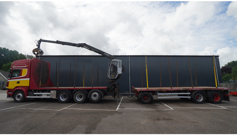 Scania R 580 V8 8X4 LOGTRANSPORT COMBI WITH MTDK YEAR 2012 TRAILER KESLA 46 CRANE - Metsaveok, Kraanaga veoauto: pilt 1 Scania R 580 V8 8X4 LOGTRANSPORT COMBI WITH MTDK YEAR 2012 TRAILER KESLA 46 CRANE - Metsaveok, Kraanaga veoauto: pilt 1