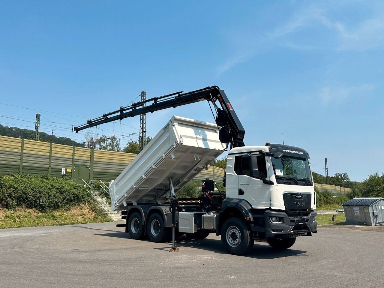 MAN TGS 33.440 6x4 /3-Seiten- Kipper / HIAB 228-6 - Kallurauto, Kraanaga veoauto: pilt 1 MAN TGS 33.440 6x4 /3-Seiten- Kipper / HIAB 228-6 - Kallurauto, Kraanaga veoauto: pilt 1