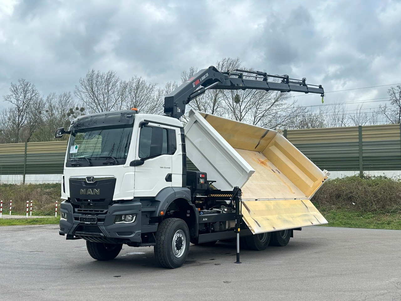 MAN TGS 33.440 6x6 /3-Seiten- Kipper / HIAB 228-4 - Kallurauto, Kraanaga veoauto: pilt 1 MAN TGS 33.440 6x6 /3-Seiten- Kipper / HIAB 228-4 - Kallurauto, Kraanaga veoauto: pilt 1