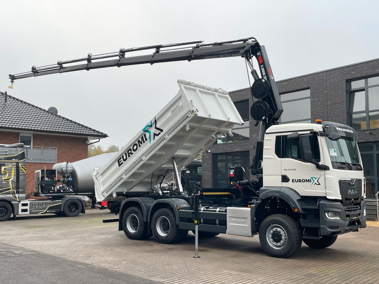 MAN TGS 33.440 6x6 /3-Seiten- Kipper / HIAB 228-6 - Kallurauto, Kraanaga veoauto: pilt 1 MAN TGS 33.440 6x6 /3-Seiten- Kipper / HIAB 228-6 - Kallurauto, Kraanaga veoauto: pilt 1
