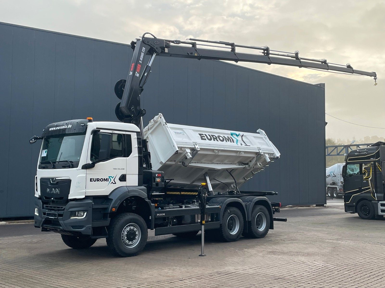 MAN TGS 33.440 6x6 /3-Seiten- Kipper / HIAB 228-6 - Kallurauto, Kraanaga veoauto: pilt 1 MAN TGS 33.440 6x6 /3-Seiten- Kipper / HIAB 228-6 - Kallurauto, Kraanaga veoauto: pilt 1