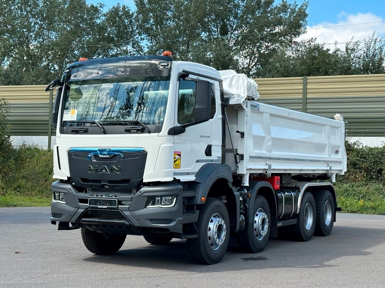 MAN TGS 41.440 8x4 EuromixMTP 3-Seiten-Kipper - Kallurauto: pilt 1 MAN TGS 41.440 8x4 EuromixMTP 3-Seiten-Kipper - Kallurauto: pilt 1