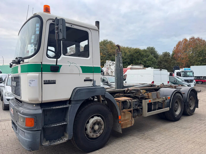MAN 33.403 **BELGIAN TRUCK-FULL STEEL-MANUAL PUMP** - Konkstõstukiga veoauto: pilt 1 MAN 33.403 **BELGIAN TRUCK-FULL STEEL-MANUAL PUMP** - Konkstõstukiga veoauto: pilt 1