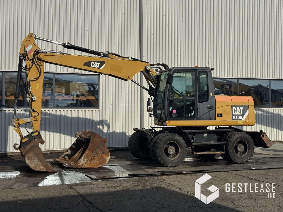 Caterpillar M313D - Ratastel ekskavaator: pilt 1 Caterpillar M313D - Ratastel ekskavaator: pilt 1