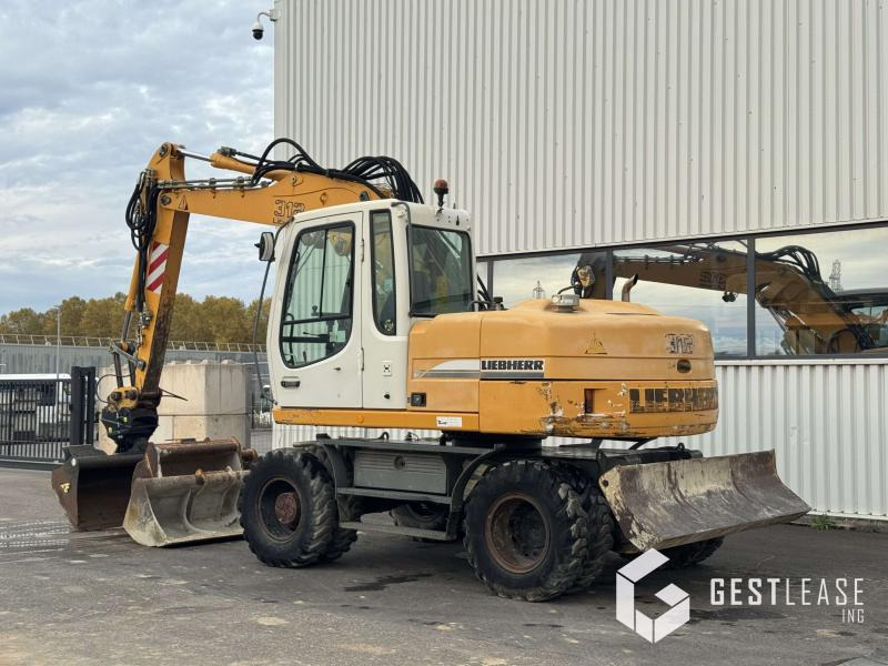 Liebherr A312 Litronic - Ratastel ekskavaator: pilt 2 Liebherr A312 Litronic - Ratastel ekskavaator: pilt 2
