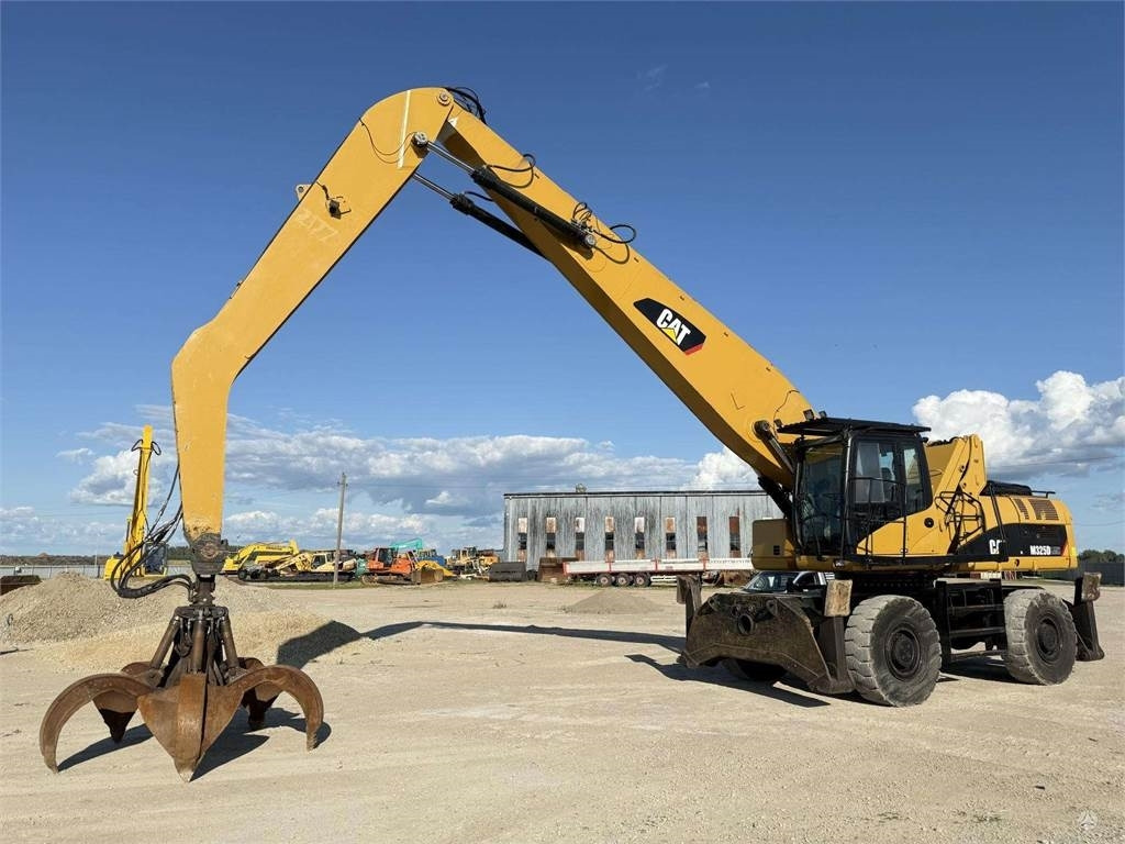 CAT M 325 DLMH - Ratastel ekskavaator: pilt 1 CAT M 325 DLMH - Ratastel ekskavaator: pilt 1