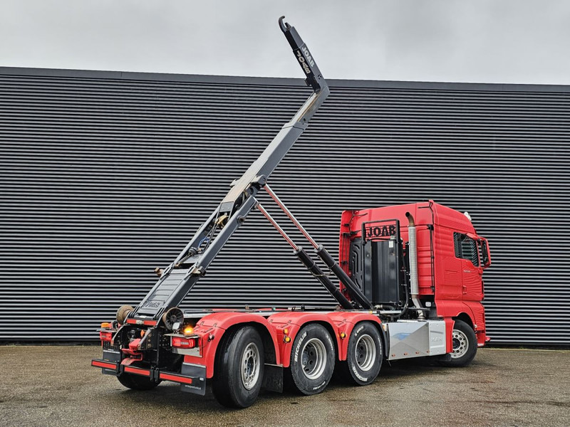 MAN TGX 35.500 / 8x4-4 / HOOKLIFT / ABROLL-KIPPER - Konkstõstukiga veoauto: pilt 4 MAN TGX 35.500 / 8x4-4 / HOOKLIFT / ABROLL-KIPPER - Konkstõstukiga veoauto: pilt 4