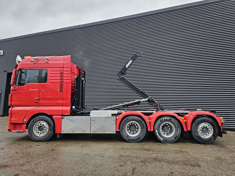 MAN TGX 35.500 / 8x4-4 / HOOKLIFT / ABROLL-KIPPER - Konkstõstukiga veoauto: pilt 2 MAN TGX 35.500 / 8x4-4 / HOOKLIFT / ABROLL-KIPPER - Konkstõstukiga veoauto: pilt 2