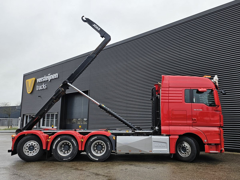 MAN TGX 35.500 / 8x4-4 / HOOKLIFT / ABROLL-KIPPER - Konkstõstukiga veoauto: pilt 5 MAN TGX 35.500 / 8x4-4 / HOOKLIFT / ABROLL-KIPPER - Konkstõstukiga veoauto: pilt 5