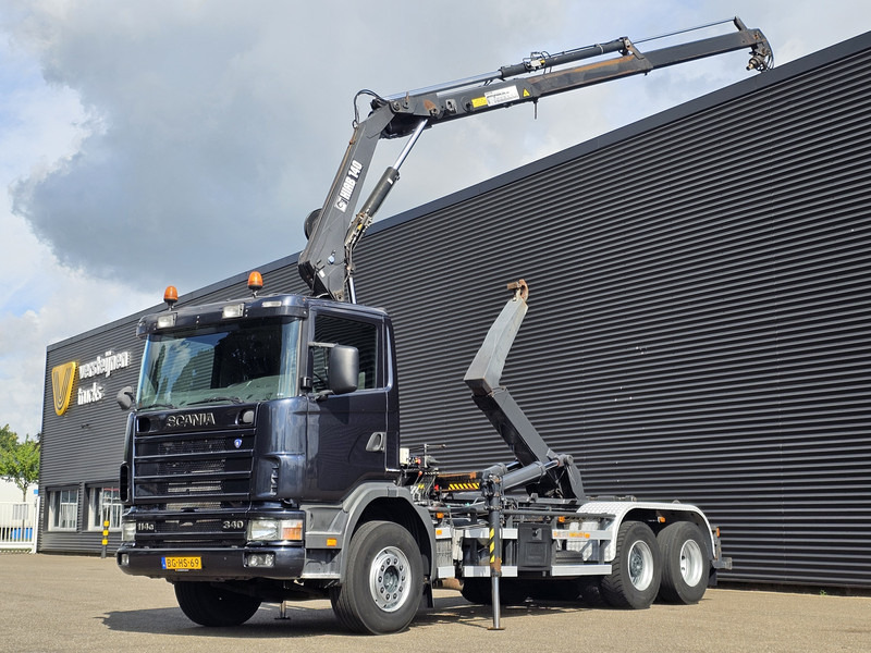 Scania R114.340 6x2 / HIAB CRANE + 25T HOOKLIFT - Konkstõstukiga veoauto, Kraanaga veoauto: pilt 1 Scania R114.340 6x2 / HIAB CRANE + 25T HOOKLIFT - Konkstõstukiga veoauto, Kraanaga veoauto: pilt 1