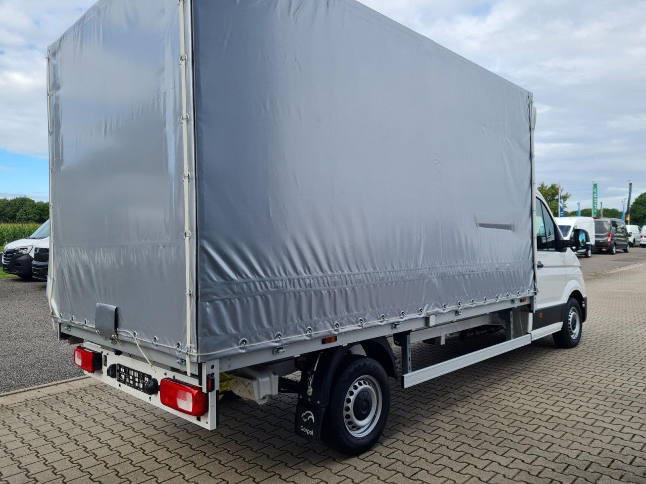 Volkswagen Crafter 35 TDI Pritsche Schiebe Plane ERGO LED T - Tent tarbesõiduk: pilt 4 Volkswagen Crafter 35 TDI Pritsche Schiebe Plane ERGO LED T - Tent tarbesõiduk: pilt 4