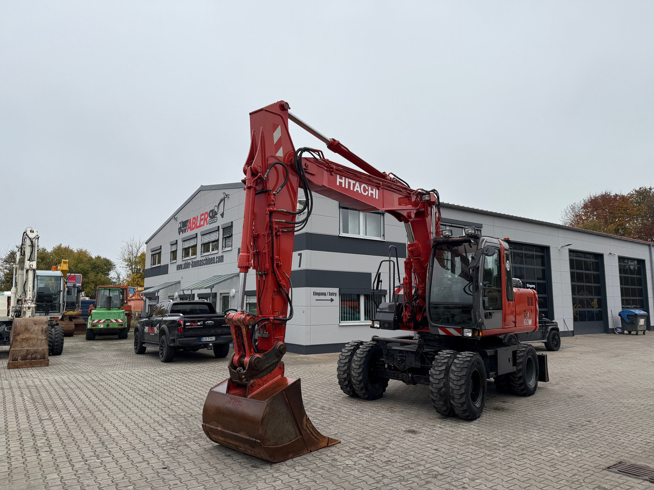 Hitachi ZX 160 W Mobilbagger Klima Zentralschmierung OQ 60-5 - Ratastel ekskavaator: pilt 2 Hitachi ZX 160 W Mobilbagger Klima Zentralschmierung OQ 60-5 - Ratastel ekskavaator: pilt 2