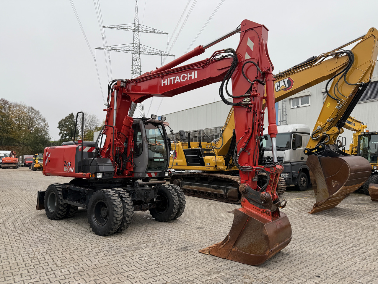 Hitachi ZX 160 W Mobilbagger Klima Zentralschmierung OQ 60-5 - Ratastel ekskavaator: pilt 3 Hitachi ZX 160 W Mobilbagger Klima Zentralschmierung OQ 60-5 - Ratastel ekskavaator: pilt 3