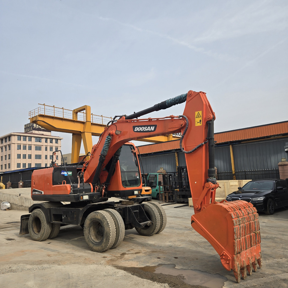 DOOSAN DX150W - Ratastel ekskavaator: pilt 1 DOOSAN DX150W - Ratastel ekskavaator: pilt 1