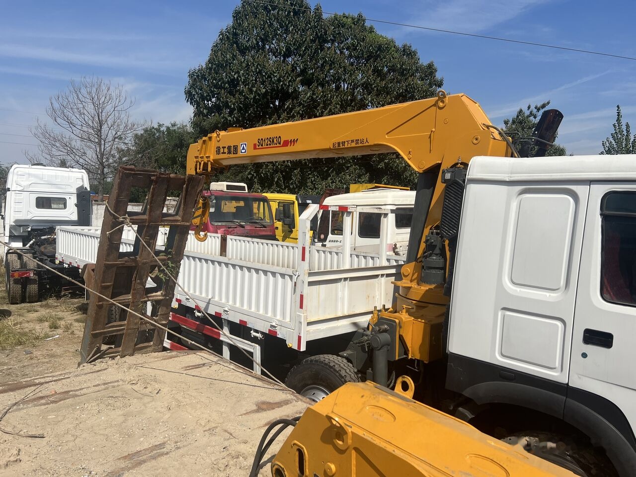 XCMG SQ12SK3Q Selfloader Truck - Kraana-manipulaator: pilt 1 XCMG SQ12SK3Q Selfloader Truck - Kraana-manipulaator: pilt 1