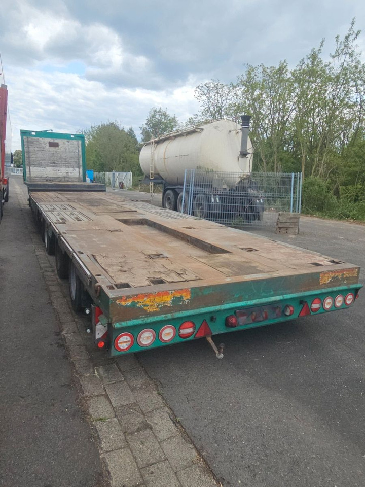 Meusburger MPG-4 Tieflader mit Radmulden 39.5t - Madal platvormpoolhaagis: pilt 3 Meusburger MPG-4 Tieflader mit Radmulden 39.5t - Madal platvormpoolhaagis: pilt 3