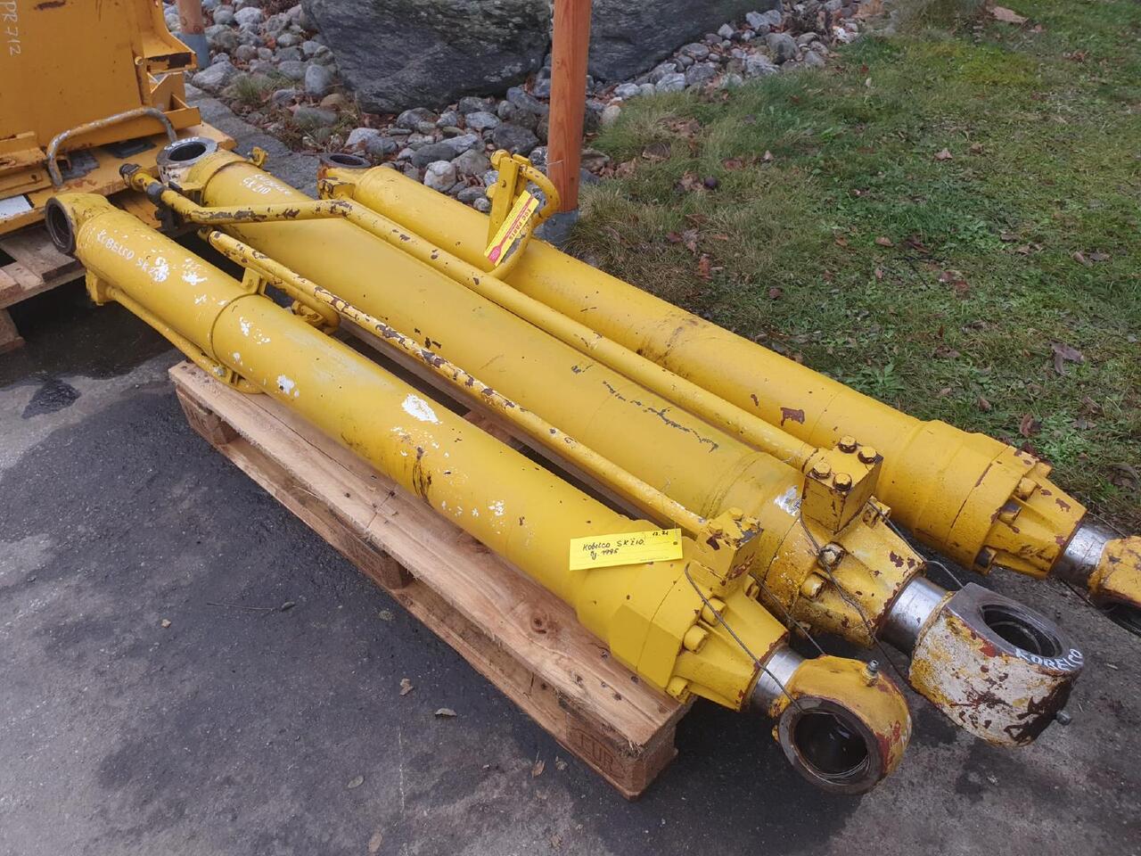Kobelco SK 210 - Hüdrauliline silinder - Ehitusmasinad: pilt 1 Kobelco SK 210 - Hüdrauliline silinder - Ehitusmasinad: pilt 1
