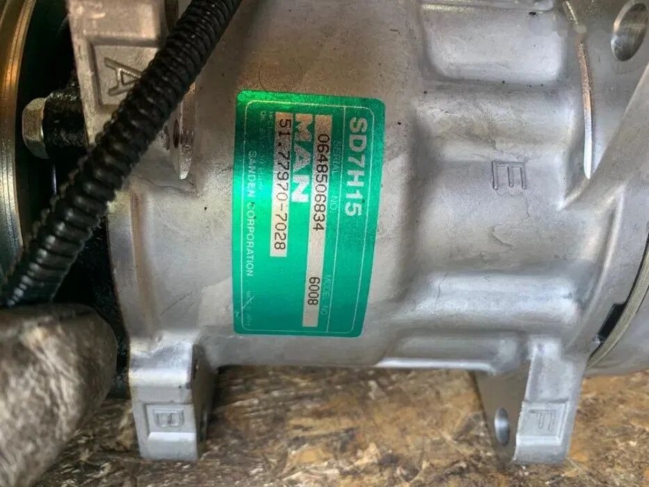 Kompresor Klimatyzacji MAN Sanden 6008 24V NOWY Oryginał Części 51.779707028 MAN - Kliimaseadme kompressor - Veoauto: pilt 2 Kompresor Klimatyzacji MAN Sanden 6008 24V NOWY Oryginał Części 51.779707028 MAN - Kliimaseadme kompressor - Veoauto: pilt 2