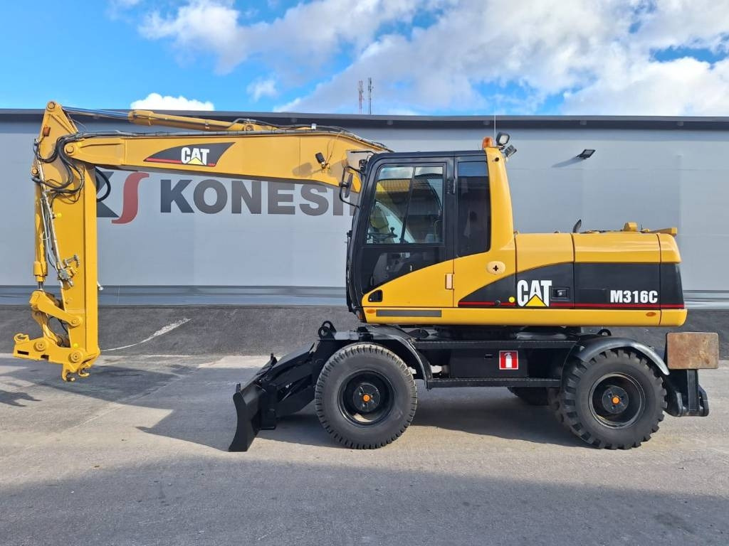 CAT M316C - Ratastel ekskavaator: pilt 1 CAT M316C - Ratastel ekskavaator: pilt 1