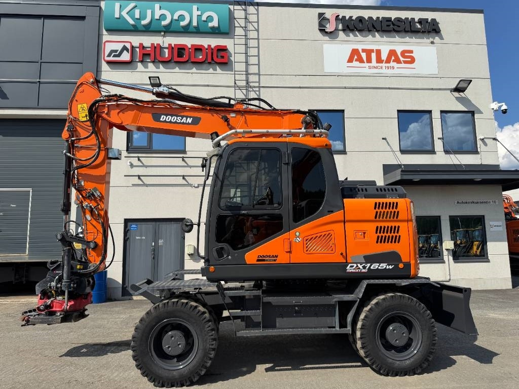 Doosan DX165W-5 PYÖRITTÄJÄLLÄ - Ratastel ekskavaator: pilt 1 Doosan DX165W-5 PYÖRITTÄJÄLLÄ - Ratastel ekskavaator: pilt 1