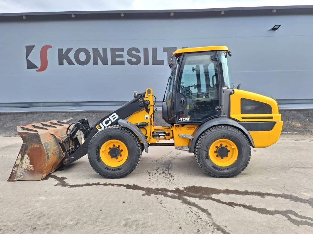JCB 409 AURA, HIEKOITIN YM. - Rataslaadur: pilt 1 JCB 409 AURA, HIEKOITIN YM. - Rataslaadur: pilt 1