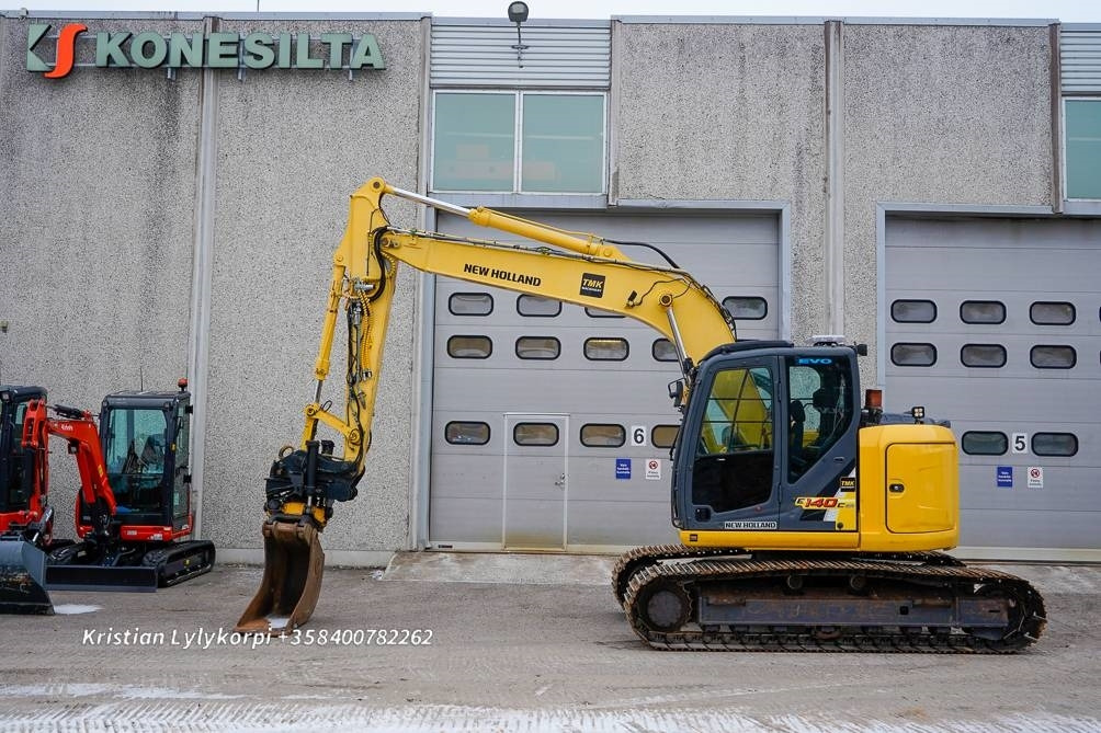 New Holland E140CSR PYÖRITTÄJÄLLÄ - Lintekskavaator: pilt 1 New Holland E140CSR PYÖRITTÄJÄLLÄ - Lintekskavaator: pilt 1