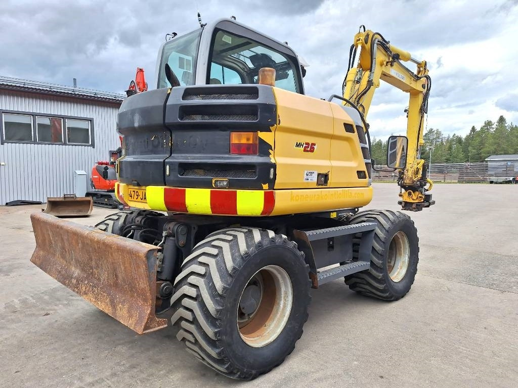 New Holland MH2.6 ENGCON PIHDEILLÄ - Ratastel ekskavaator: pilt 4 New Holland MH2.6 ENGCON PIHDEILLÄ - Ratastel ekskavaator: pilt 4
