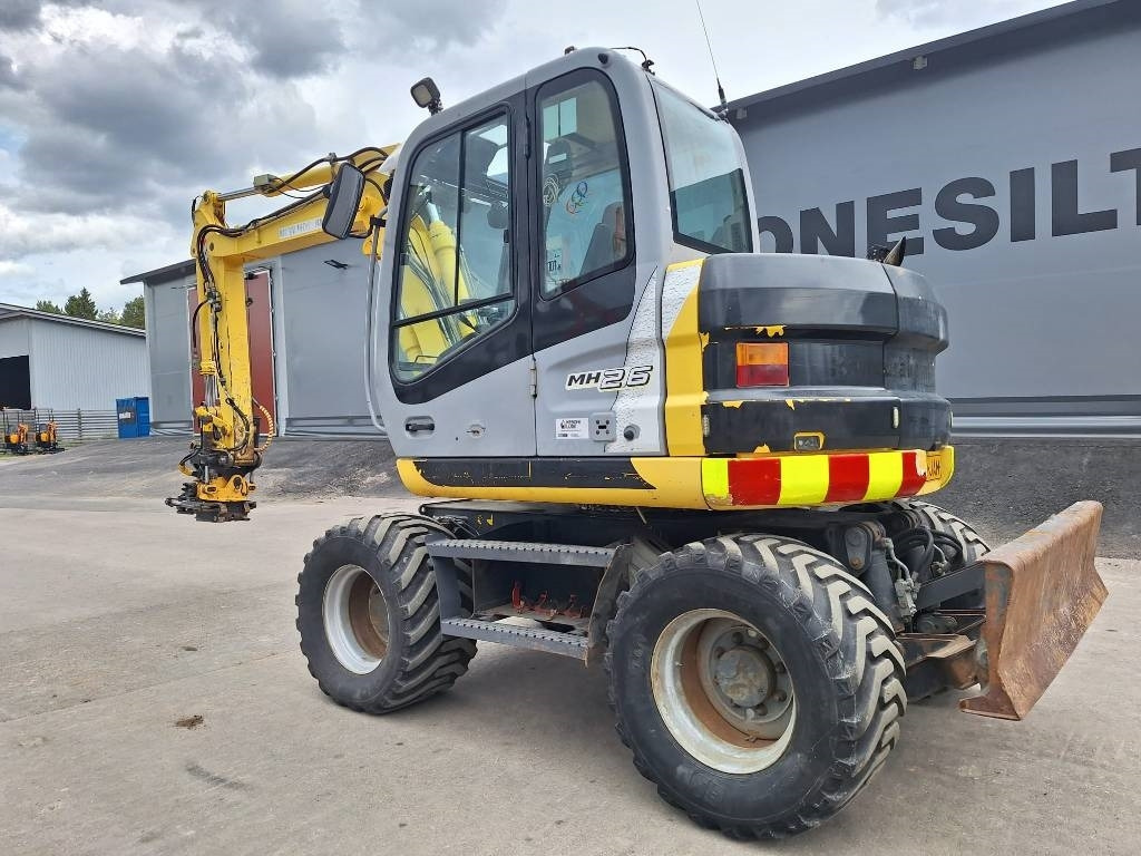 New Holland MH2.6 ENGCON PIHDEILLÄ - Ratastel ekskavaator: pilt 2 New Holland MH2.6 ENGCON PIHDEILLÄ - Ratastel ekskavaator: pilt 2