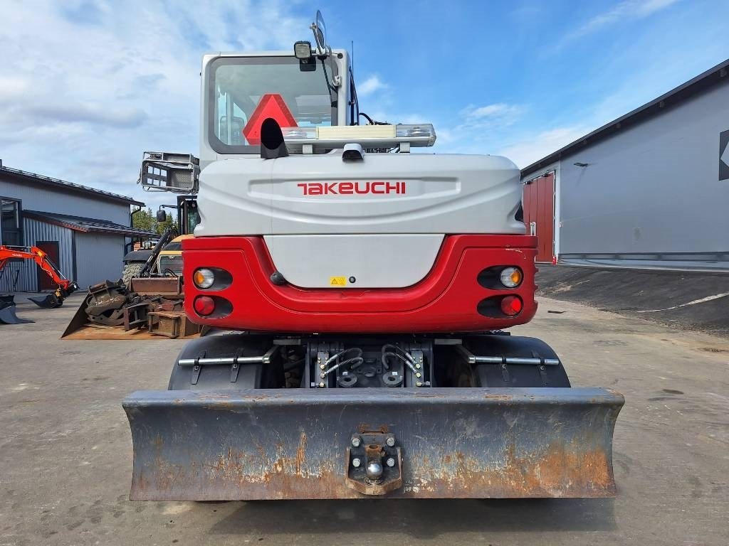 Takeuchi TB295W KÄRRY, PYÖRITTÄJÄ, 5-KAUHAA - Ratastel ekskavaator: pilt 3 Takeuchi TB295W KÄRRY, PYÖRITTÄJÄ, 5-KAUHAA - Ratastel ekskavaator: pilt 3