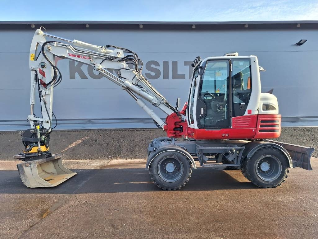 Takeuchi TB295W PYÖRITTÄJÄLLÄ  - Ratastel ekskavaator: pilt 1 Takeuchi TB295W PYÖRITTÄJÄLLÄ  - Ratastel ekskavaator: pilt 1