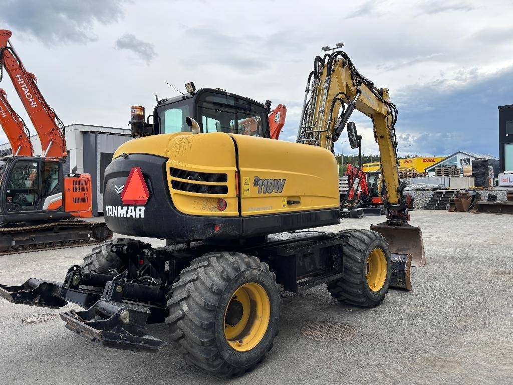 Yanmar B110W PYÖRITTÄJÄLLÄ - Ratastel ekskavaator: pilt 4 Yanmar B110W PYÖRITTÄJÄLLÄ - Ratastel ekskavaator: pilt 4