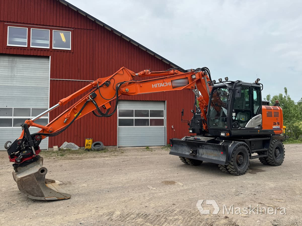 Hjulgrävare Hitachi Zaxis 140W med redskap - Lintekskavaator: pilt 1 Hjulgrävare Hitachi Zaxis 140W med redskap - Lintekskavaator: pilt 1