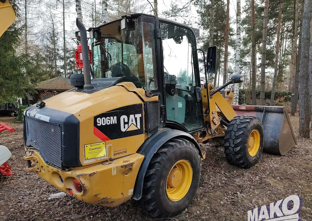 Caterpillar 906M - Rataslaadur: pilt 1 Caterpillar 906M - Rataslaadur: pilt 1