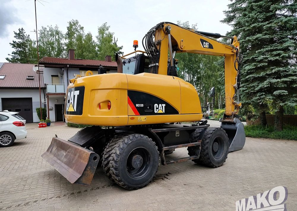 Caterpillar M313D - Ratastel ekskavaator: pilt 4 Caterpillar M313D - Ratastel ekskavaator: pilt 4