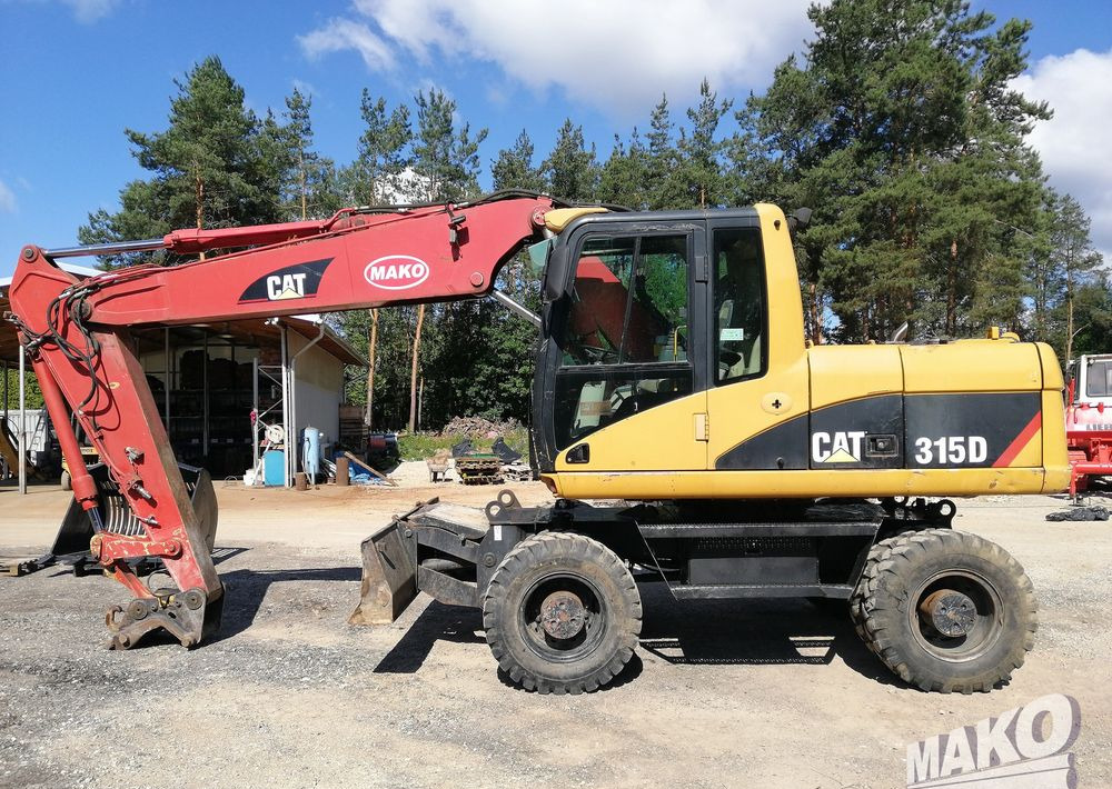 Caterpillar M315 C - Ratastel ekskavaator: pilt 2 Caterpillar M315 C - Ratastel ekskavaator: pilt 2