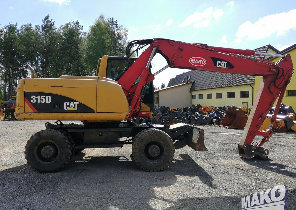 Ratastel ekskavaator Caterpillar M315 C: pilt 6