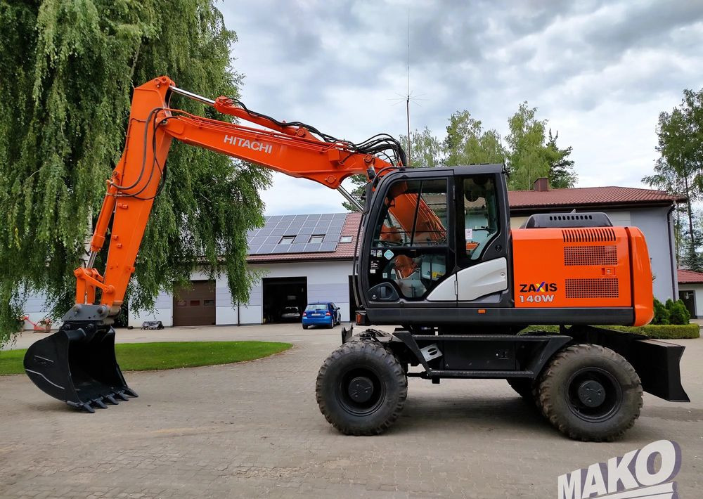 Hitachi ZX 140 - Ratastel ekskavaator: pilt 1 Hitachi ZX 140 - Ratastel ekskavaator: pilt 1